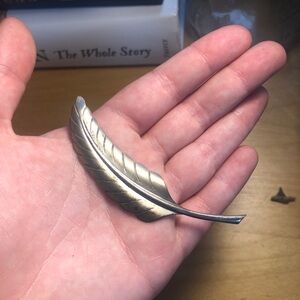 large silver colored metalic feather pin broach vintage
